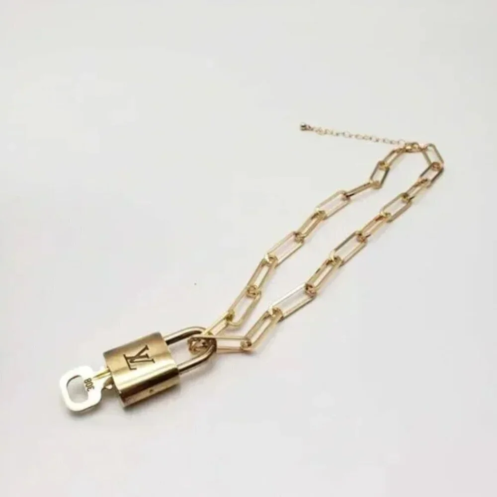 Authentic Louis Vuitton Lock and Key Gold Color with Gold Plated Chain Necklace